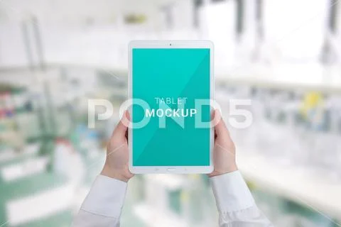 Tablet mockup in woman hands PSD Template
