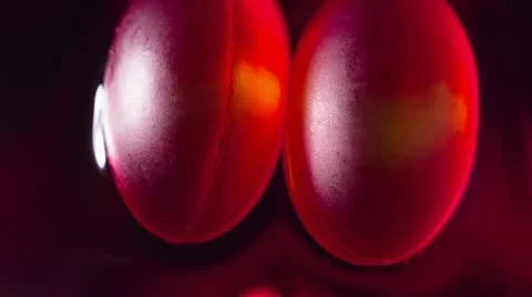 Tablet morphing red dye Stock Footage 21761030