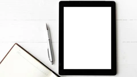 Tablet with notebook Stock Photos