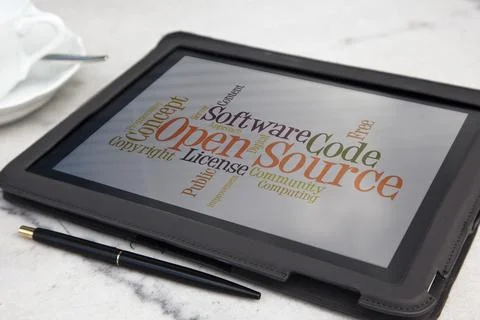 Tablet with open source software word cloud Stockfoto's