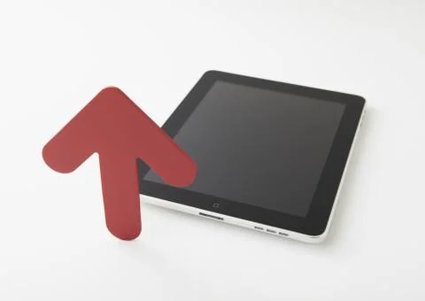 Tablet PC and arrow Stock Photos