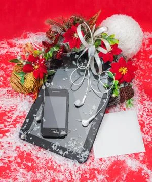 Tablet pc and cell phone black color best christmas gifts. Stock Photos