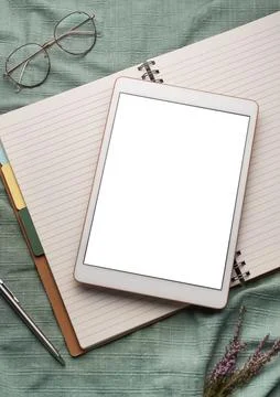 Tablet pc  and notebooks  on the office desk Stock Photos