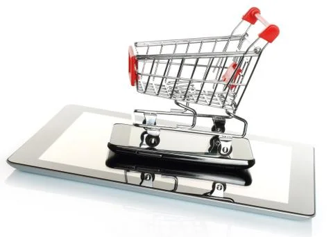 Tablet pc and smart phone with shopping cart . Stock Photos