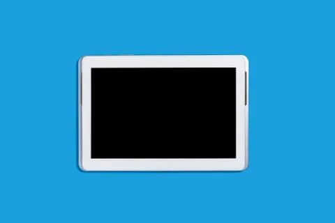 Tablet pc on a blue background Stock Photos