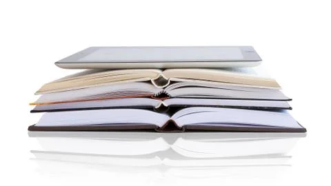 Tablet pc on books Фото