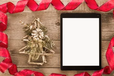 Tablet pc with christmas decorations Stock Photos