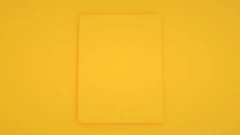 Tablet pc computer isolated on yellow trendy color background. 3d illustratio Foto stock