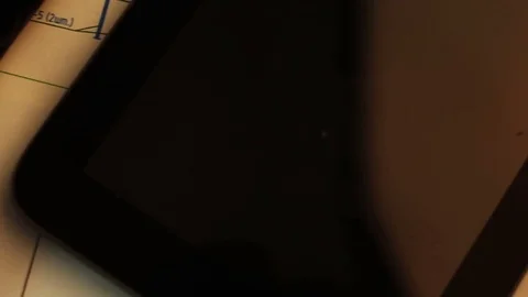 Tablet PC with drawings on the table with Blueprints. Stock Footage 72775914