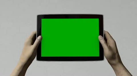 Tablet pc gaming, alpha matte, green screen included. Stock Footage 11383156