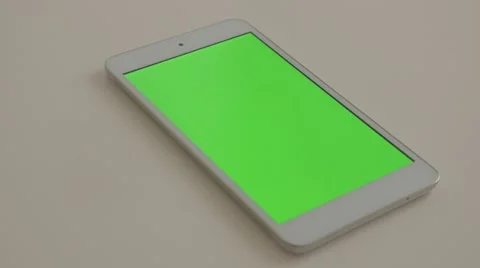 Tablet PC with green screen display whi... | Stock Video | Pond5