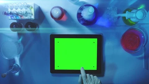 Tablet PC with a Green Screen in the Laboratory.Top View. 스톡 동영상 71695836
