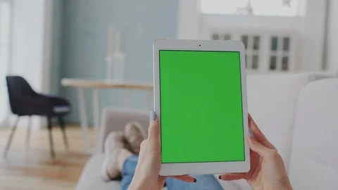 Tablet PC with Green Screen or Mock-up Tracking in Girl Hands. Using Portable Stock Footage 122415911