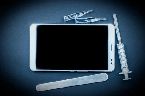 Tablet pc with medical objects on a desk Stock Photos