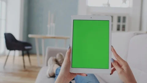 Tablet PC or Mobile Computer with Green Screen or Mock-up Tracking Display. Girl Stock Footage 122416167