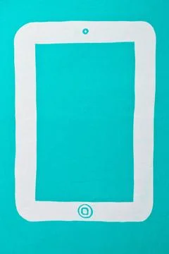 Tablet PC pictured at bright turquoise wall Abstract Tablet PC pictured at... Stock Photos