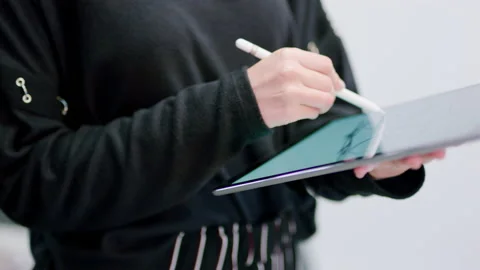 Tablet, pen of graphic designer hands with 3d bicycle model for digital Stock Footage 218140346