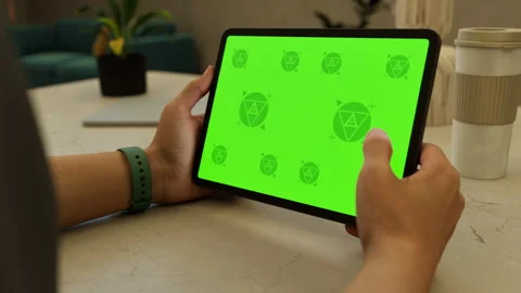 A tablet in a person's hand on an home office desk Stock Footage 292909856