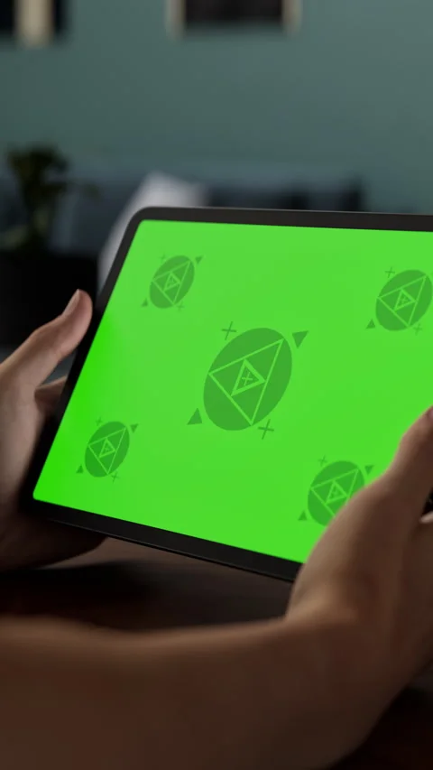 A tablet in a person's hand on an home office desk Stock Footage 292910042