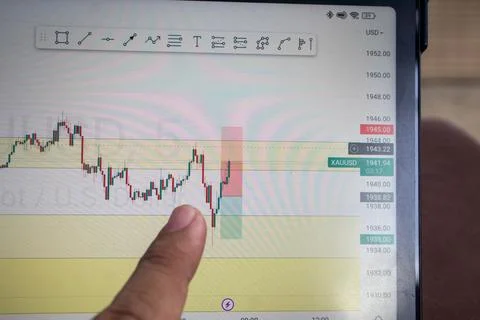 Tablet phone on the dining table. Trading foreign exchange anywhere Stock Photos