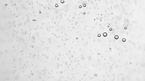 Tablet pill dissolving in water Stock Footage 74580700