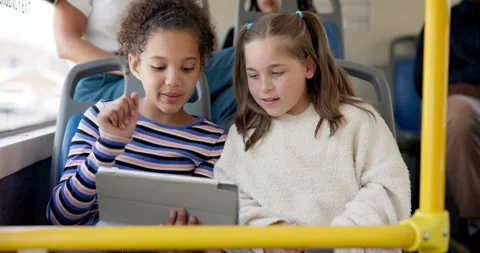 Tablet, playing and children on bus for travel together with educational game Stock Footage 301274426