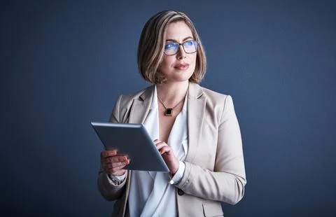 Tablet, problem solving and business woman in studio with space, thinking o.. Stock Photos