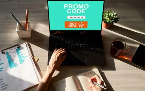 Tablet with promo code field on screen. E-commerce, mobile marketing concept. 写真素材