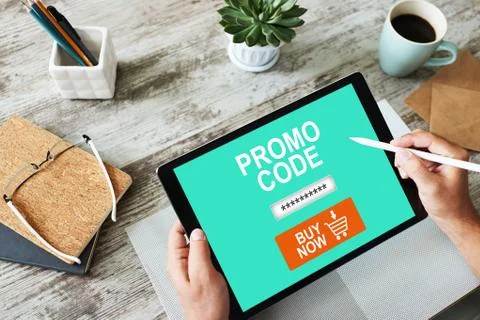 Tablet with promo code field on screen. E-commerce, mobile marketing concept. Foto stock