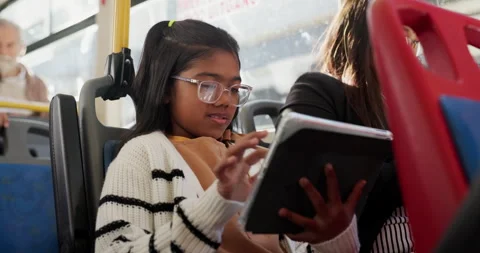 Tablet, relax and child playing game on bus for travel, journey or commuting in Stock Footage 308472533