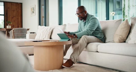 Tablet, remote work and man with document in home for account manager, client Stock Footage 335795382