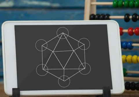 Tablet on a school table with school icons on screen Stock Photos