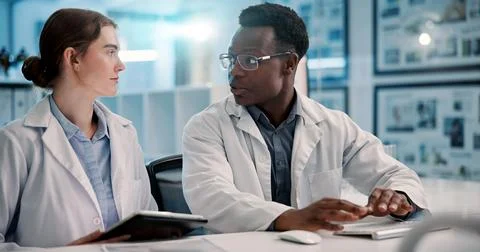Tablet, scientist and team talking for medical healthcare, problem solving and Stock Photos