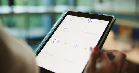 Tablet, screen and hand with smart home app for security system, dashboard and Stock Photos