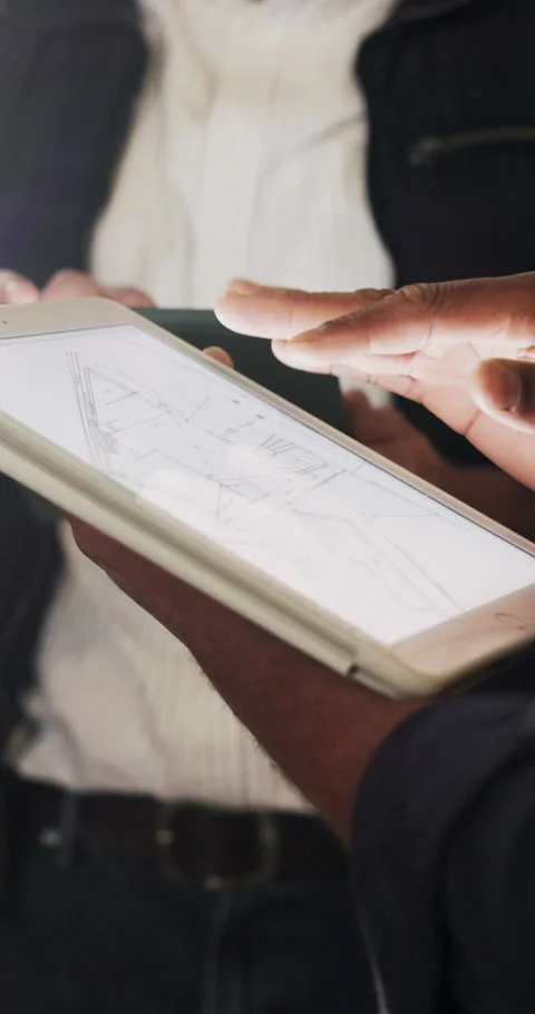 Tablet screen, blueprint and hands of construction workers on site for repairs Stock Footage 340760924