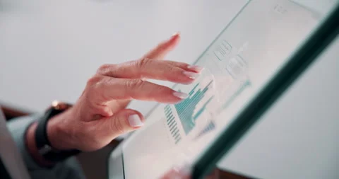 Tablet screen, graphs and hands of businesswoman in office with research for Stock Footage 335923131