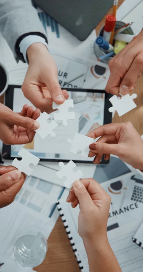 Tablet screen, puzzle and above of business people hands in office for smart Stock Footage 320102080