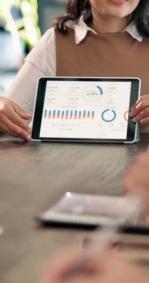 Tablet screen, statistics and hands of businesswoman in office with research on Stock Footage 340600507
