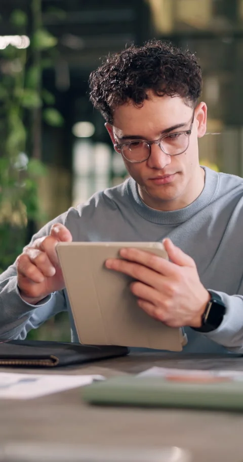 Tablet, scroll and glasses with business man for planning, insurance policy and Stock Footage 340772163