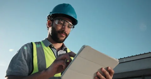 Tablet, solar panels and construction worker on site outdoor with research for Stock Footage 343512810