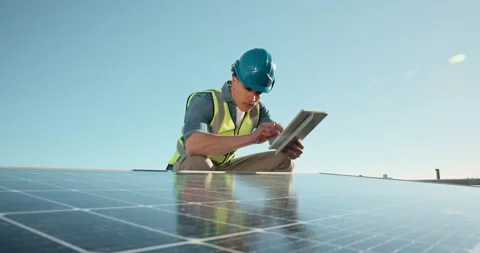 Tablet, solar panels and engineer on site outdoor with email update on repairs Stock Footage 343631990