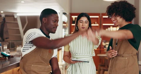 Tablet, stack of hands and waiters in restaurant with celebration for online Stock Footage 318296403