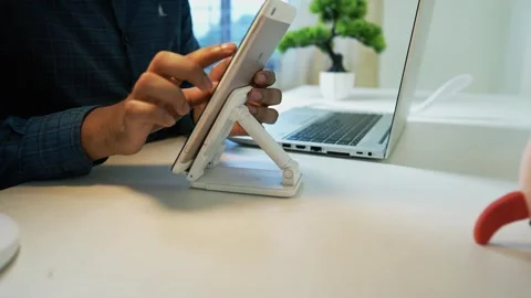 Tablet on Stand with Laptop in Modern Workspace Video stock 320725906