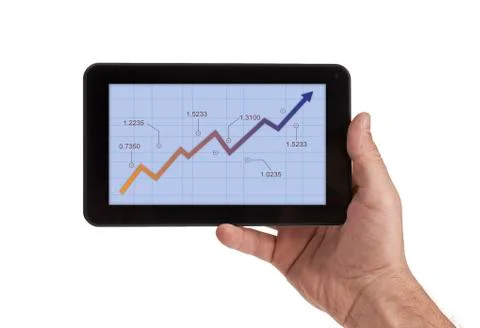 Tablet with the stock market graph on display Stock Photos