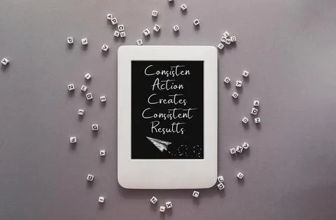 The tablet is surrounded by a pile of white cubes Foto stock