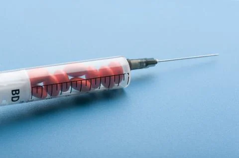 Tablet in syringe macro Stock Photos