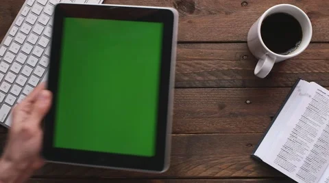 Tablet on table greenscreen Stock Footage 63375397
