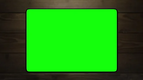 The tablet takes off above the surface of the table and shows the information Video stock 260983379