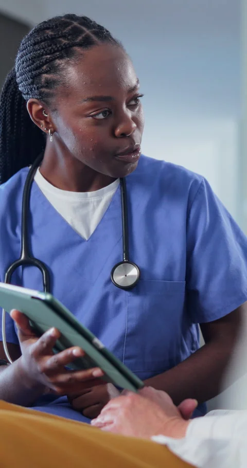 Tablet, talking and nurse with senior person in home for help, checkup and Stock Footage 340734718