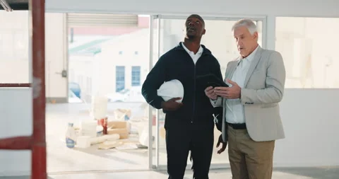 Tablet, team and discussion at construction site for maintenance, building Stock Footage 341460430